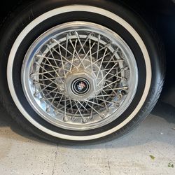 New tires with Buick regal rims and hood caps
