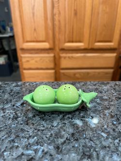 Vintage Ceramic Peas in a pod  Salt and Pepper Shakers  Set.  Brand new never used.  Has been on display in a cabinet with a very large salt and peppe