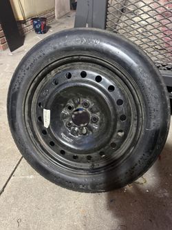 Spare Tire With Still Rim 5x4.5”bc
