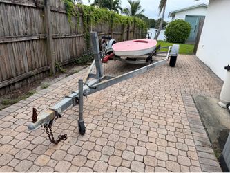 B & S Sportsmen Boat Trailer with Sunfish Boat. Some rust and wear. About 16.5’ Long 7.5’ Wide