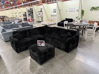 Black sectional with ottoman