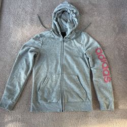 Adidas grey jacket with pink writing on one sleeve
