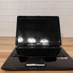 Asus Laptop, Charger and Case to carry it