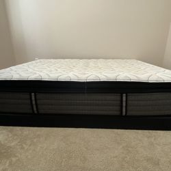 Full size bed with box frame from Sealy. Used.