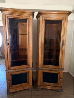 Matching pair of Wood Curio Cabinets with glass doors