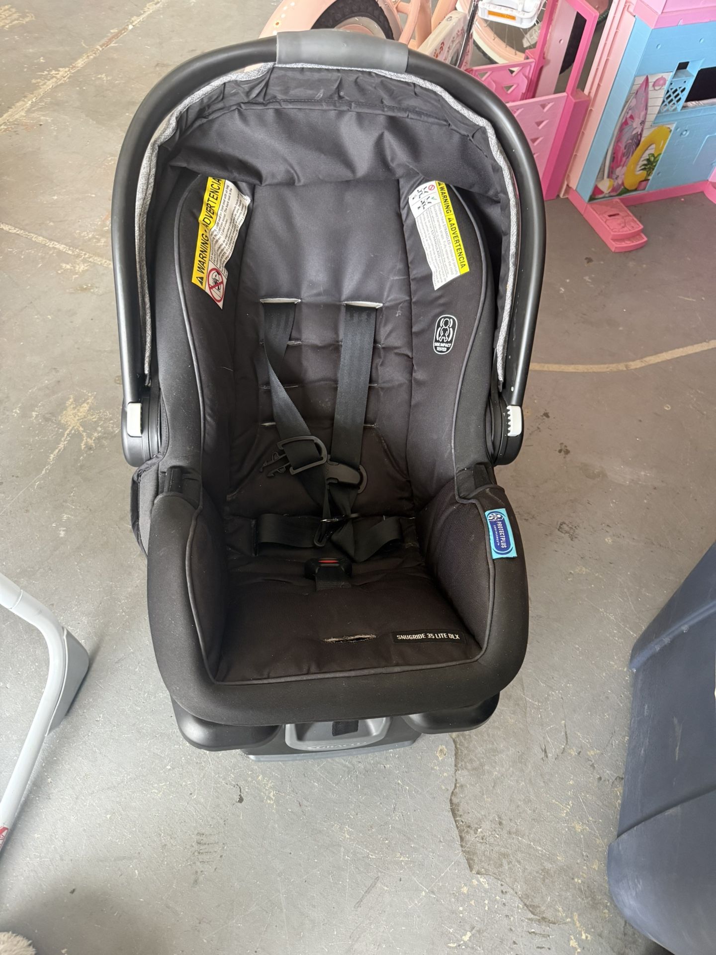 Graco SnugRide 35 Lite DLX Infant Car Seat + Base – $35