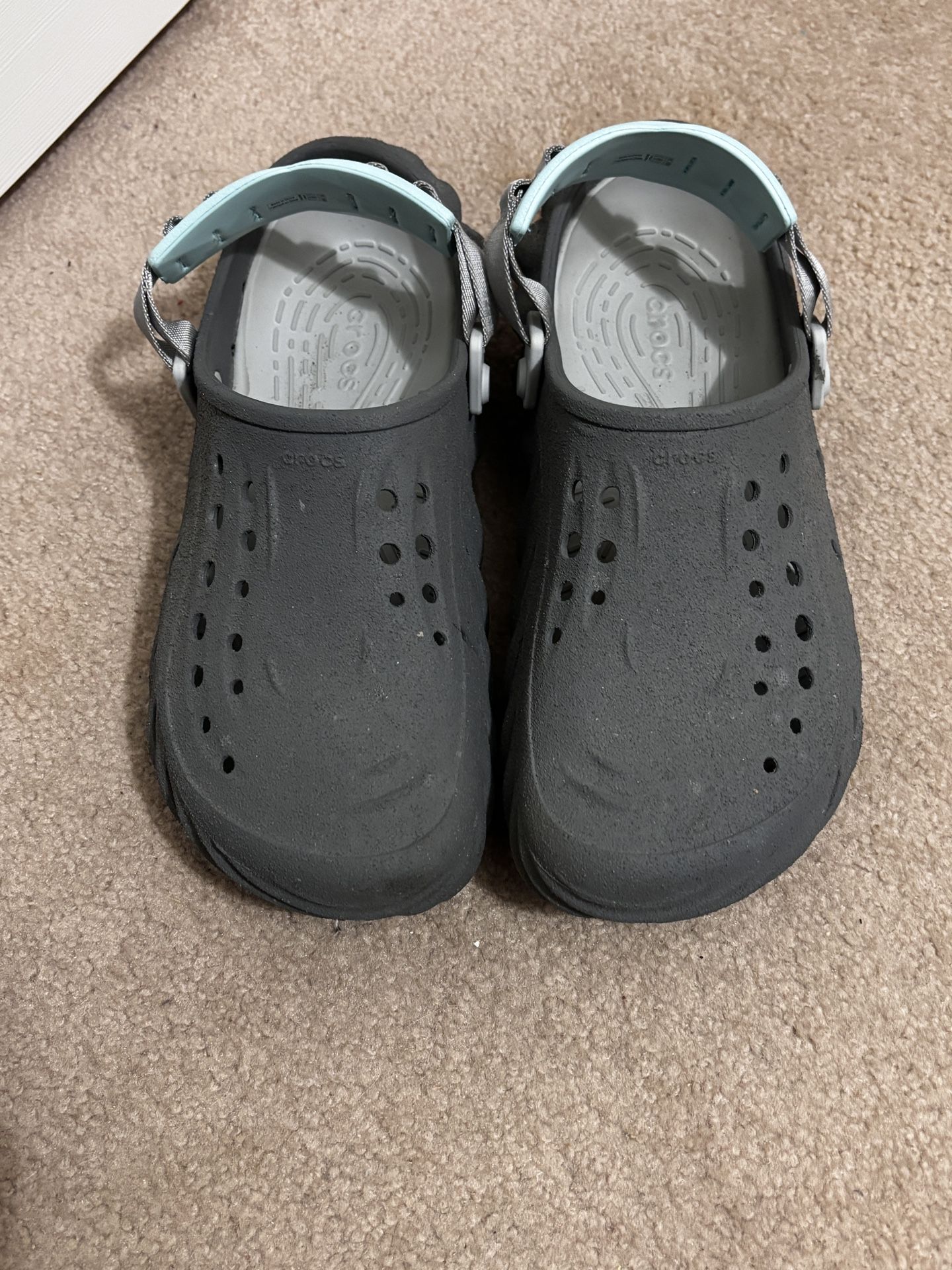 Grey Crocs are from The Echo Collection