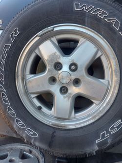 4 tire plus spare tire  with rims 235/85/16"