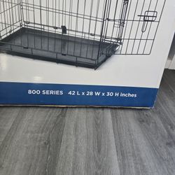 Dog Crate measured in the box this new only open box 