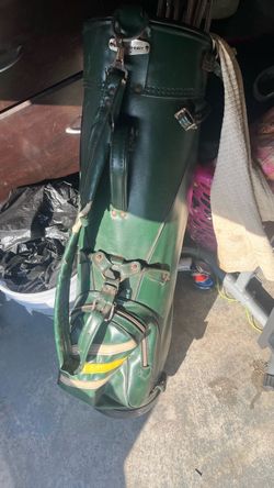 acushnet green golf bag with golf clubs used