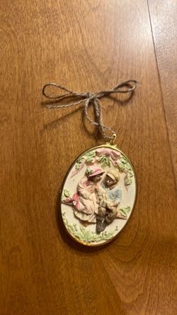 Oval Bisque Relief ornament with Twine Hanger