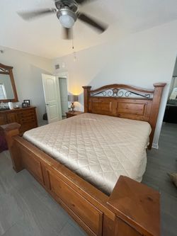 King size bedroom set includes 2 nightstands, dresser, mirror and chest plus mattress.