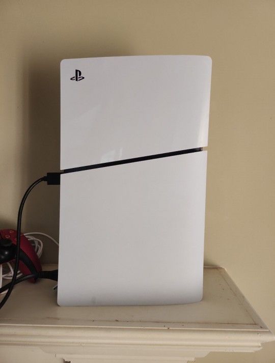 ps5 console with controller