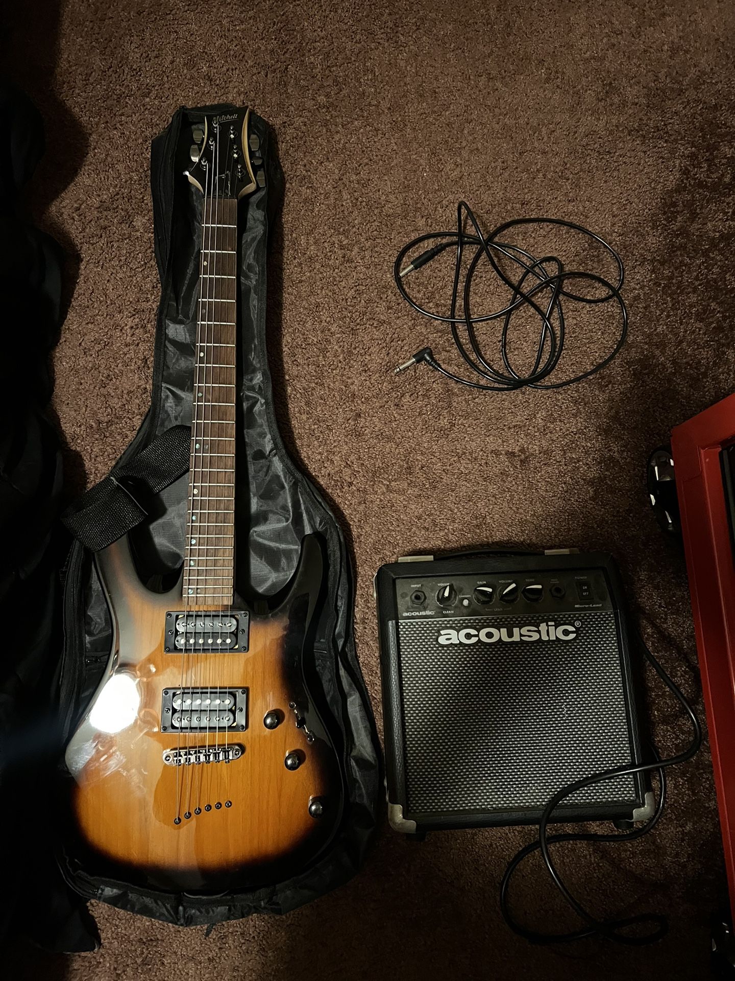 Mitchell Electric Guitar With Amp, Cord, Extra Strings ,And Carrying Case!