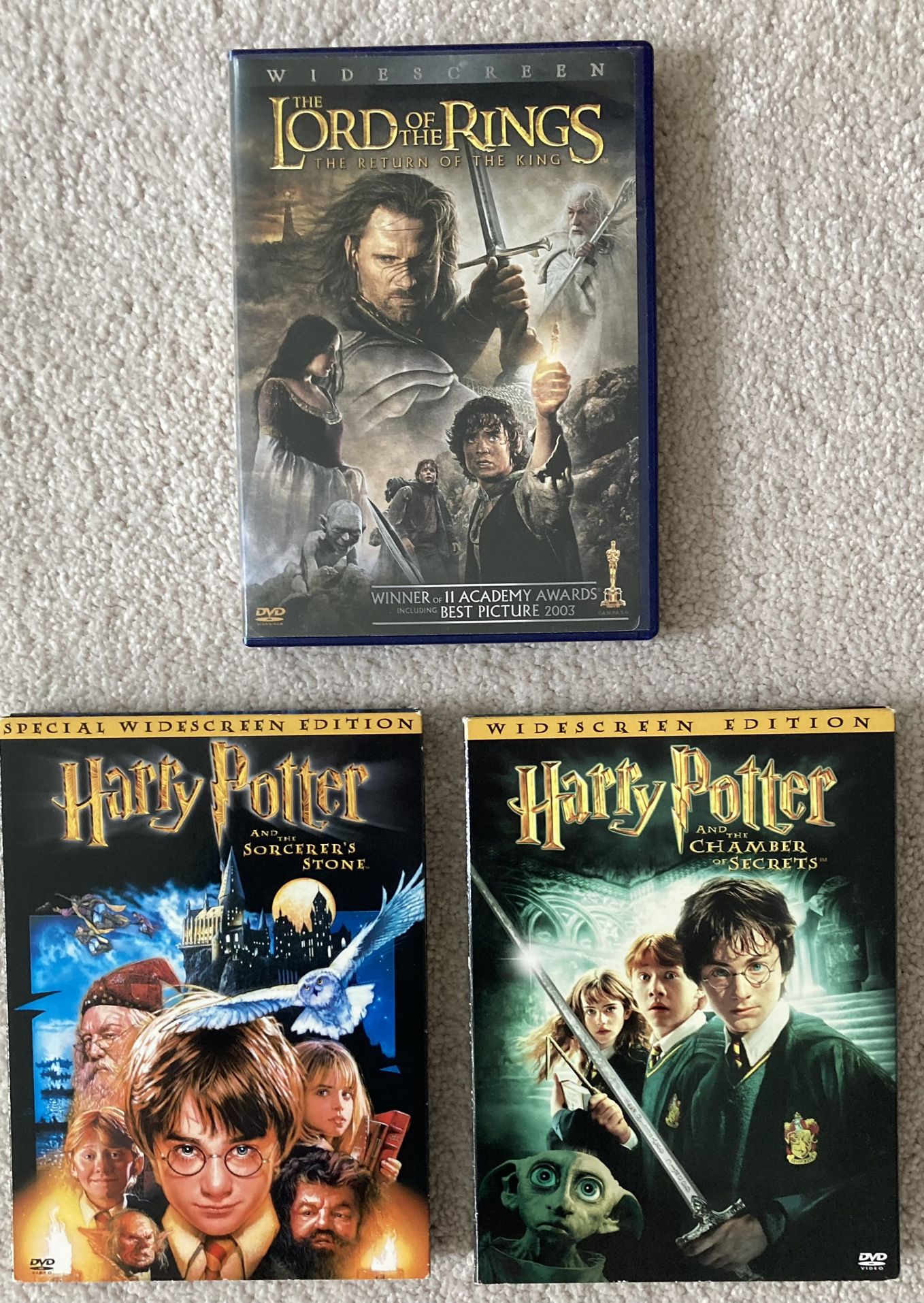 Set Of 3 Harry Potter And Lord Of The Rings DVDs.