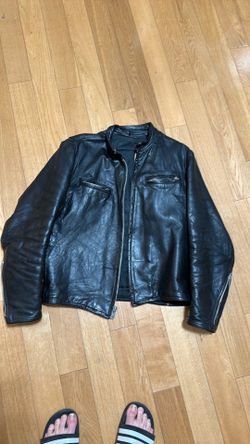 Vintage black leather motorcycle jacket. 1970s.