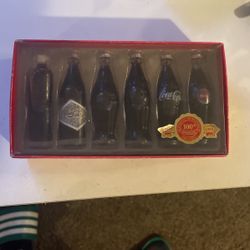 100 Years Of Coco-cola Bottles  OBO