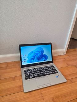 Hp laptop 14 inch i7 8gb ram 256gb ssd with charger, ms office and adobe or best offers