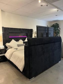 Wingback TV bed in black corduroy features 16 color settings with crystal accent display