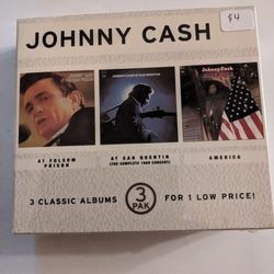 Three Johnny Cash Albums. Unopened