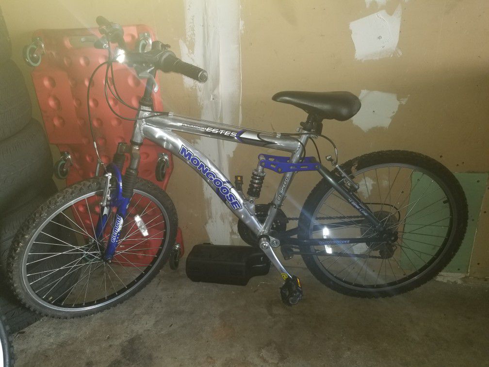 Mongoose Mountain bike , the bike needs air and cleaning and its ready to ride .
