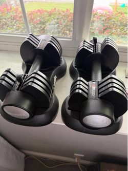 Pair of 5-25lbs adjustable dumbbells