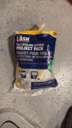 Tile leveling system and grout sealer