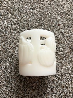 Pumpkin wax candle
