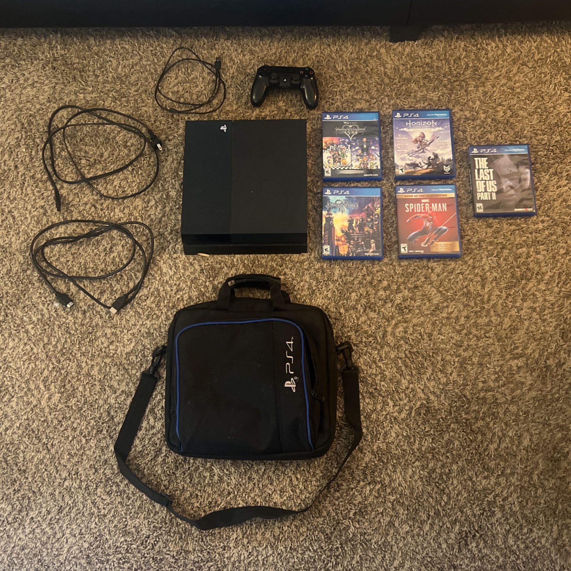 Used PS4, Games And Traveling Case
