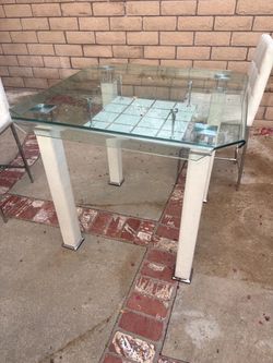 High Glass Table and 4 chairs set