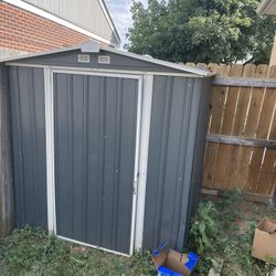 2 Storage Sheds 