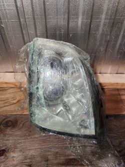 2005,2010 cadillac sts rh headlight