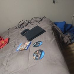 PS4 With Black Controller and 2 Games