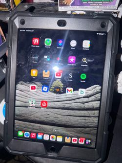 iPad Air 2 , with rugged case and screen protector.