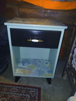 Light green nightstand.