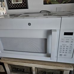 New Ge Wall Mount Microwave