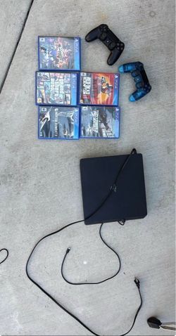 PS4 Slim Bundle with 2 Controllers and 5 Games