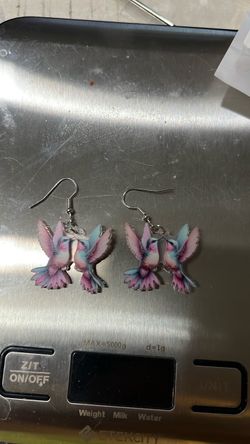 Two way humming bird silver