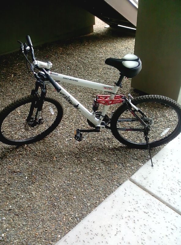 For sale - 26" Genesis V2100 mountain bike with accessories /LIKE NEW ! $ 125.00 need to sell!