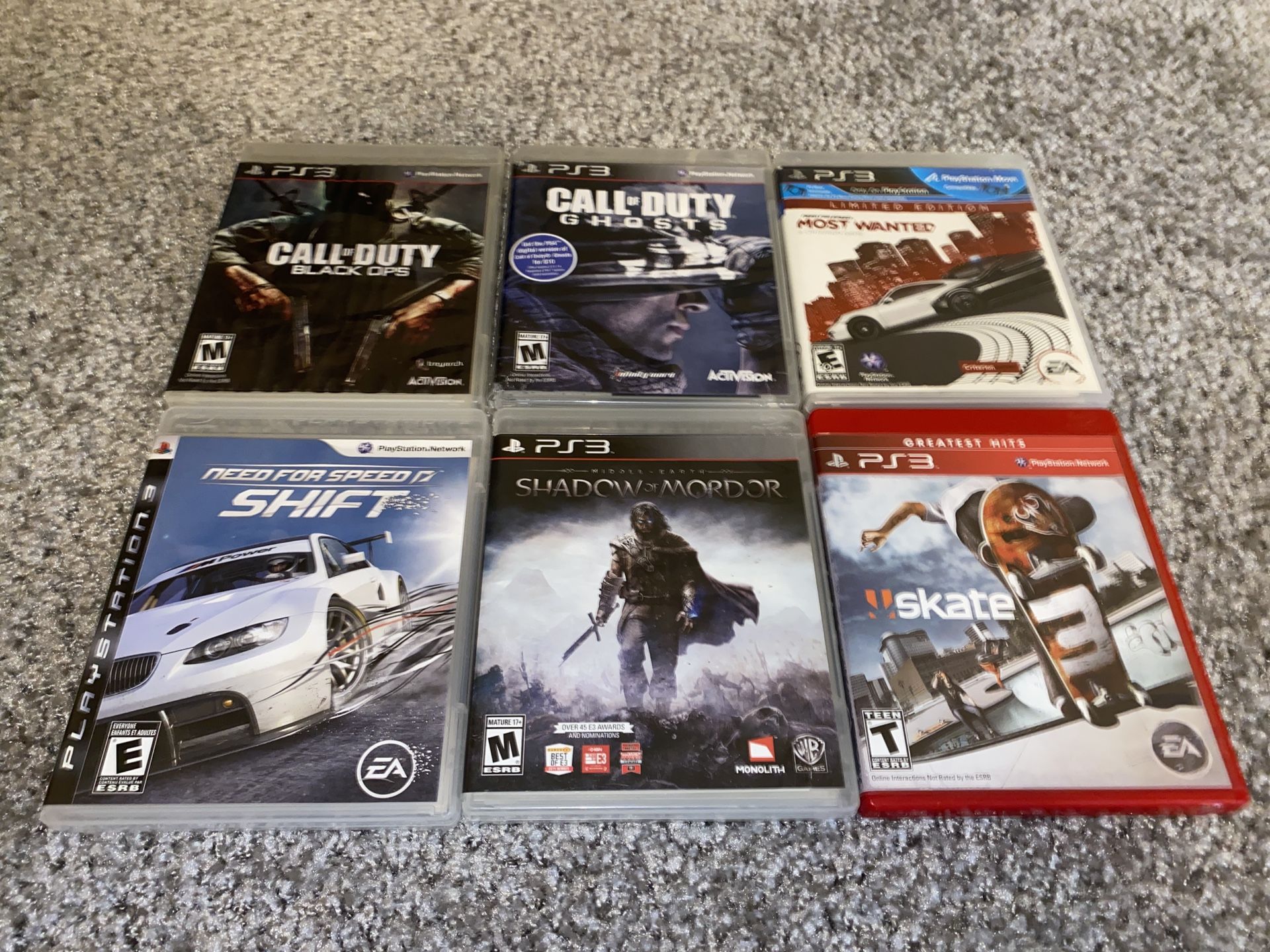 Six Empty PS3 Game Cases