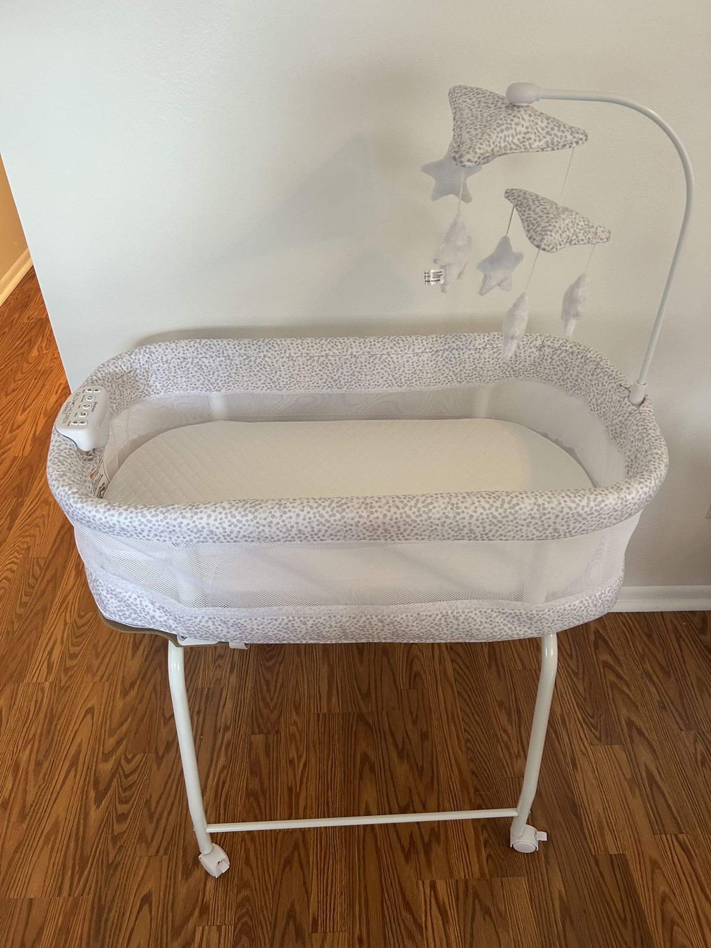 Delta Children SmartSleep Auto Glide Bassinet with Bluetooth Alloy