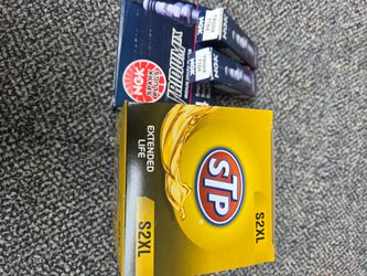 Oil filter and spark plugs for ford.Escape
