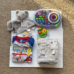 Set for children.  Clothes and toys.