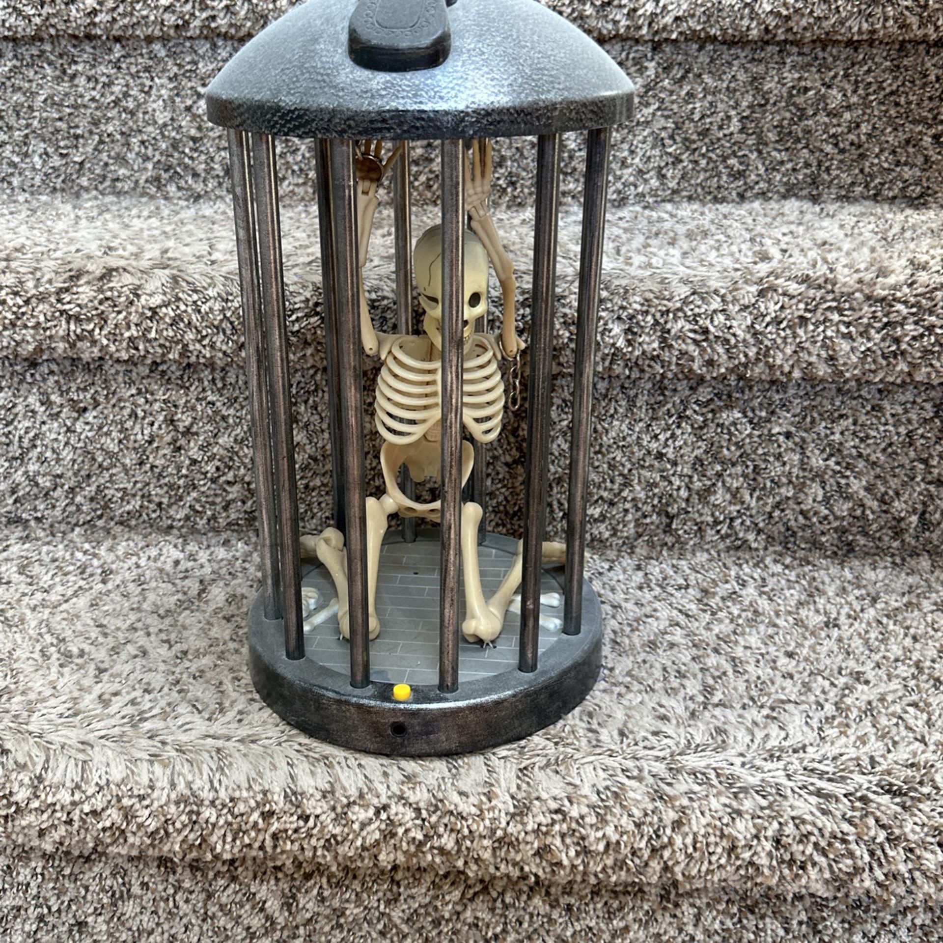 Halloween Skeleton In A Cage Talks When You Hit The Yellow Button