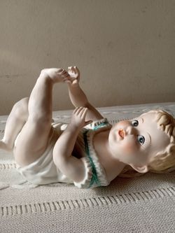 Vintage piano baby.  Bisque porcelain.