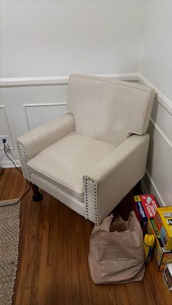 White chair; 34in high x 28in wide x 24in depth