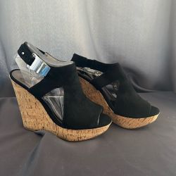 7.5 black wedges, Carlos Santana