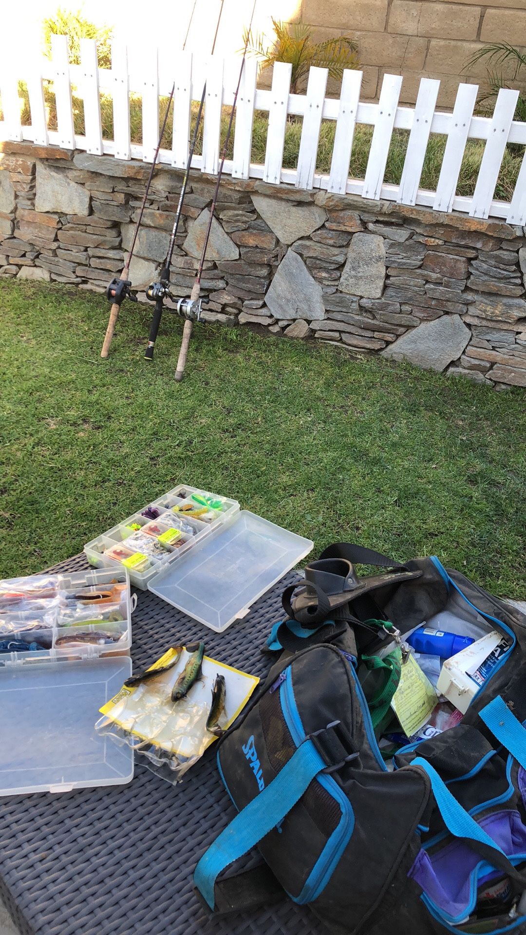 THREE (3) Fishing Rods and Reels with a Large Tackle Bag FULL of fishing Stuff.