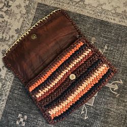 Woven clutch bag