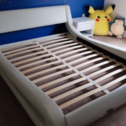 Queen Size Bed With A Night Stand